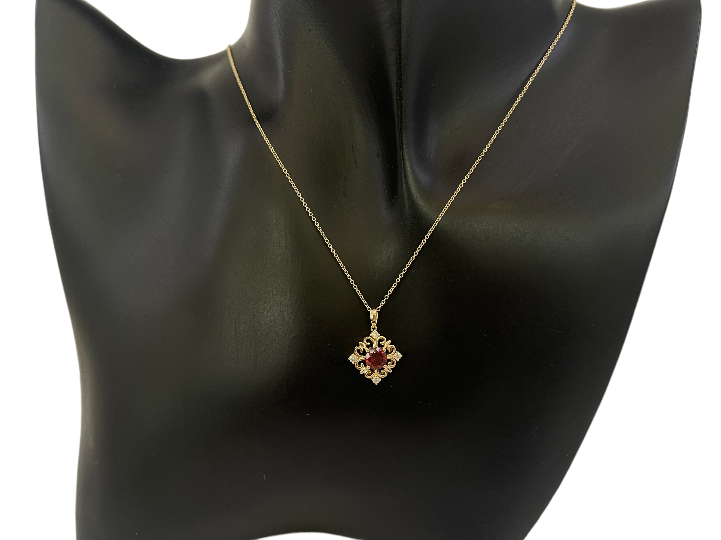 10K Yellow Gold 5mm Round Cut Garnet and 0.09cttw Diamond Pendant - 18 inches
