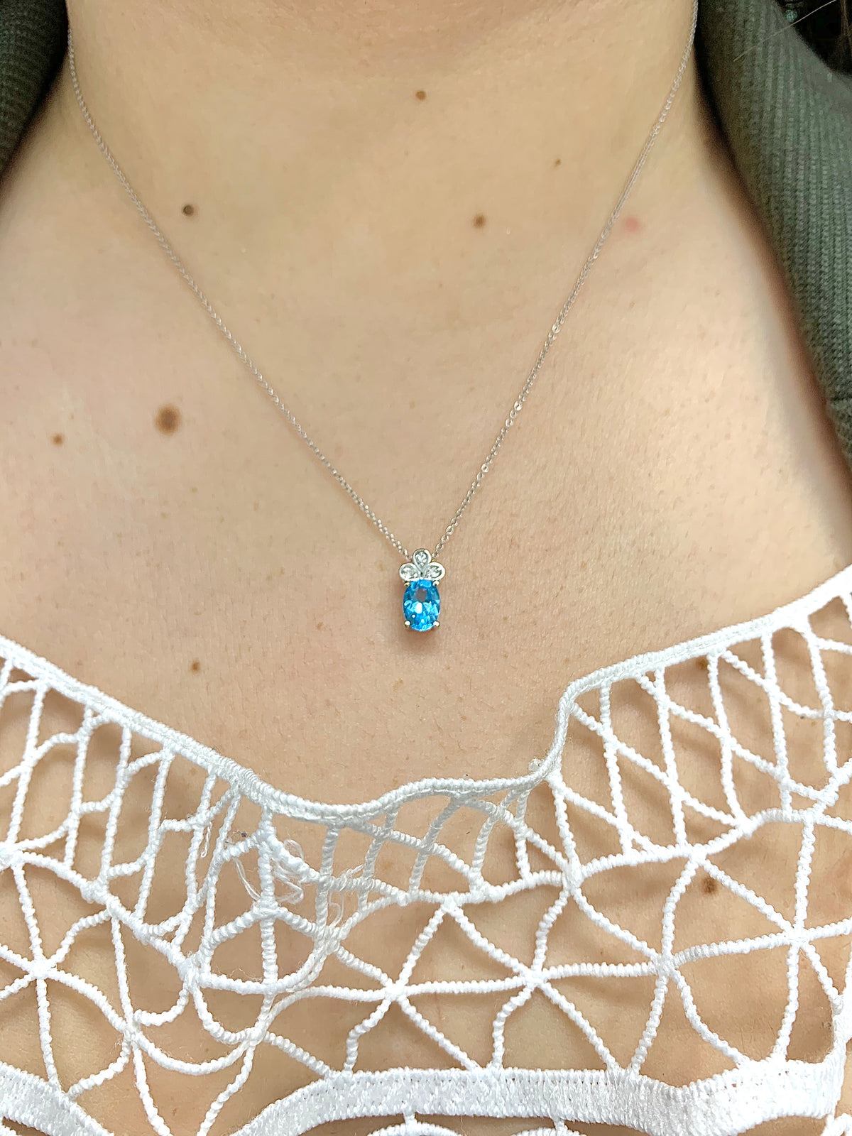 Blue Topaz and Diamond Pendant