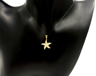 Dije de estrella de mar de oro amarillo de 10 quilates con circonita cúbica