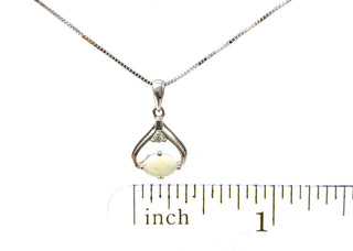 Colgante de ópalo y diamantes