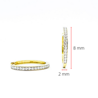 Aretes tipo argolla con diamantes de 0,10 quilates en oro amarillo de 10 quilates