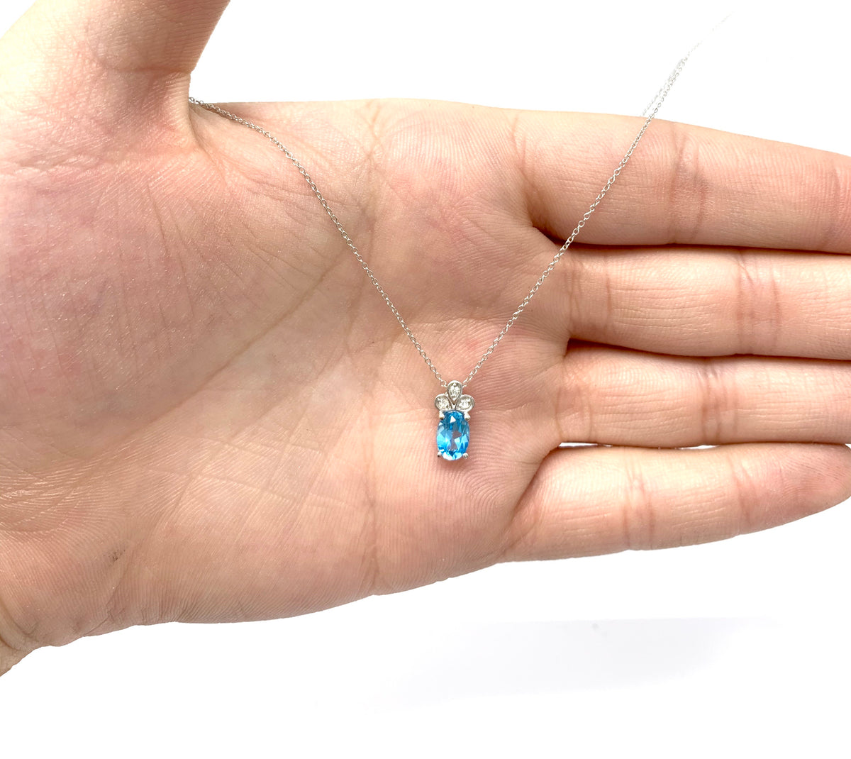 Blue Topaz and Diamond Pendant